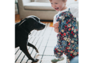 Child dancing with dog